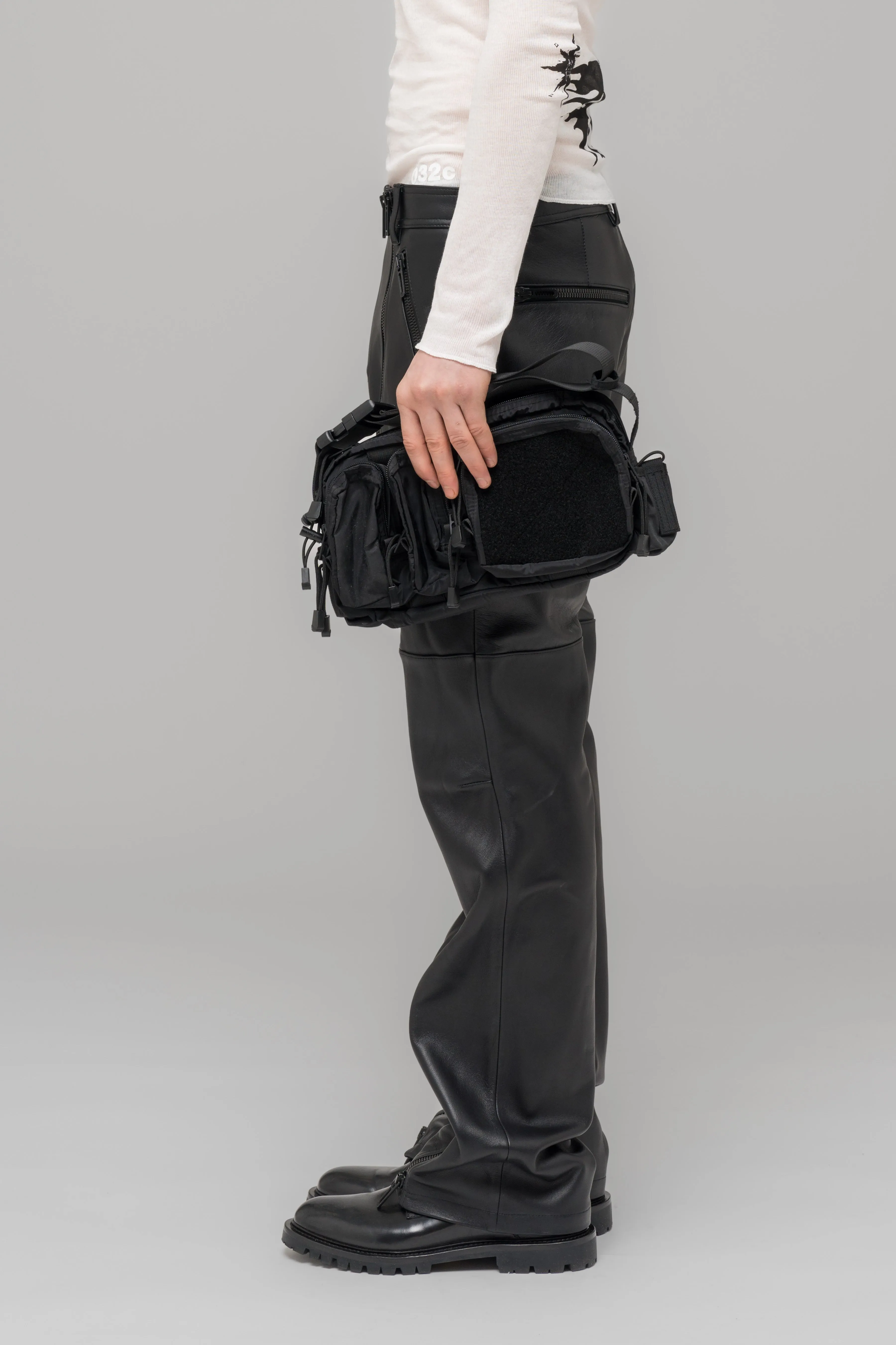 "SINGULAR" LEATHER ZIP TROUSERS